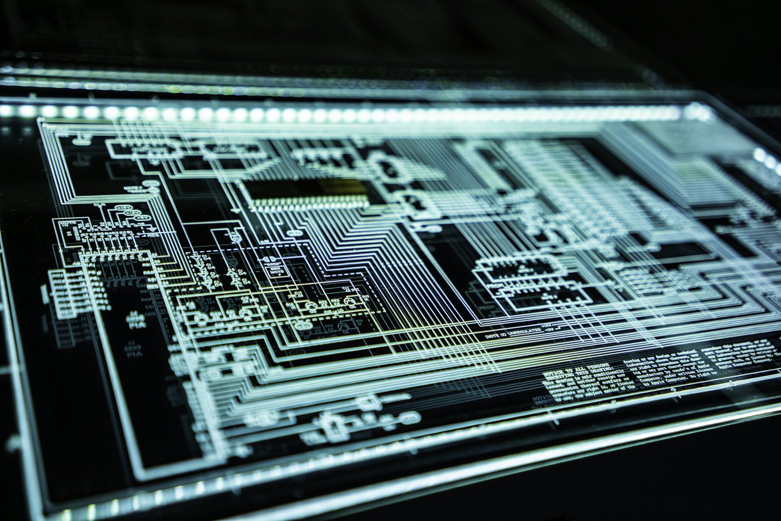 An illuminated circuit representing AI compute